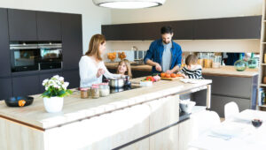 Family cooking together in the kitchen